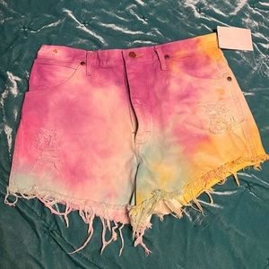 Hand tie dyed wrangler cut off shorts from Southern Belle boutique